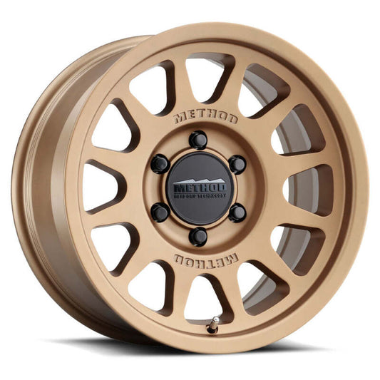 Method MR703 17x9 Inch Bronze Bead Grip Off-Road Wheel with -12mm Offset and 6x5.5 Bolt Pattern