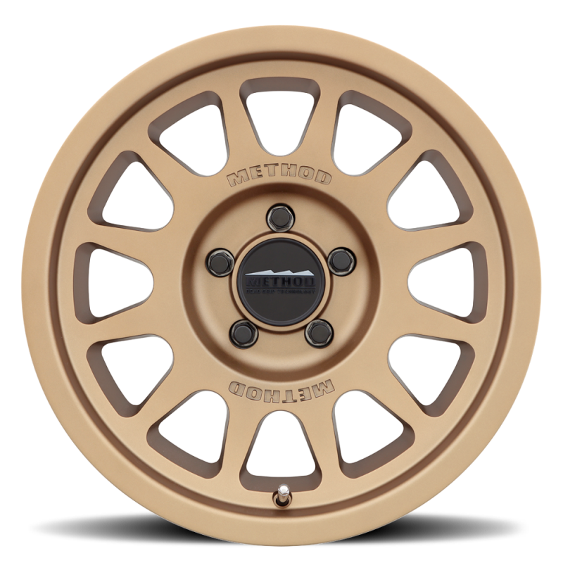 Method MR703 17x8.5 Bronze Bead Grip® Off-Road Wheel with 5x5 Bolt Pattern and 71.5mm Hub Bore
