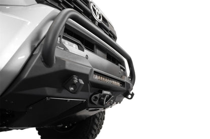 Addictive Desert Designs 2024 Toyota Tacoma Stealth Center Mount Winch Front Bumper with Top Hoop and 20-Inch Light Bar Mount
