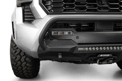 Addictive Desert Designs 2024 Toyota Tacoma Stealth Center Mount Winch Front Bumper with Top Hoop and 20-Inch Light Bar Mount