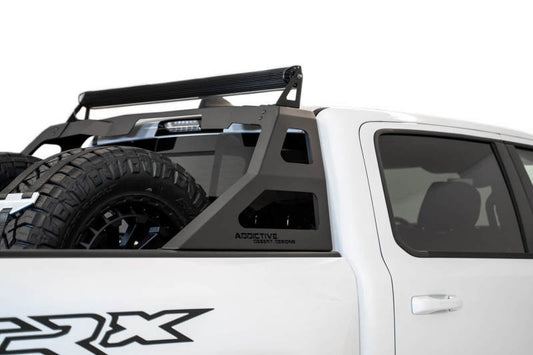 Addictive Desert Designs Stealth Fighter Chase Rack for Ram 1500 TRX (2021-2023) with 50-Inch Light Bar Mount in Hammer Black