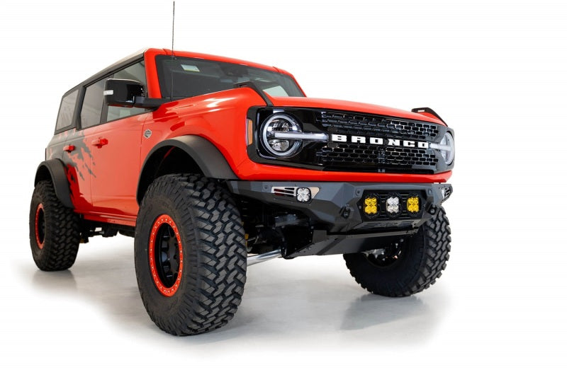 Addictive Desert Designs Bomber Front Bumper for Ford Bronco 2021-2023 with Baja Designs LP4 Mounts and D-Rings in Hammer Black