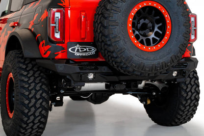 Addictive Desert Designs Stealth Fighter Rear Bumper for Ford Bronco 2021-2023 – Hammer Black with Satin Black Panels and Cube Light Mounts