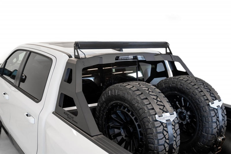 Addictive Desert Designs Stealth Fighter Chase Rack for Ram 1500 TRX (2021-2023) with 50-Inch Light Bar Mount in Hammer Black